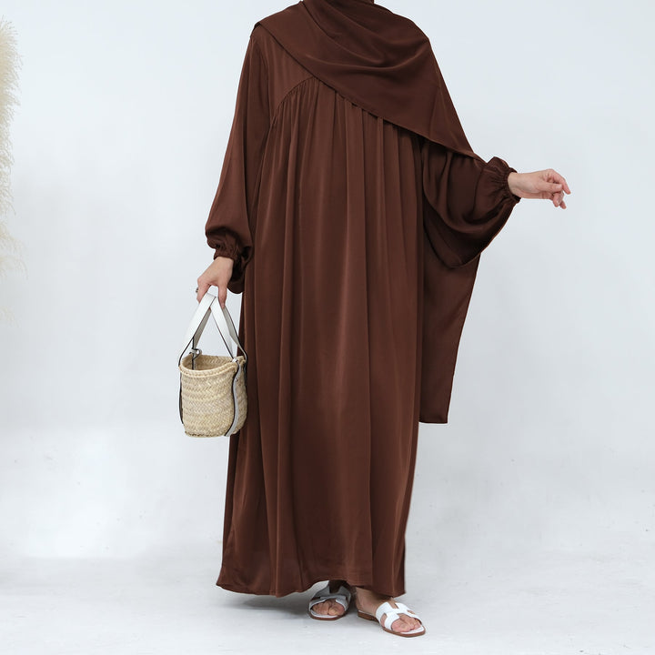 Get trendy with Amelia Satin Abaya Set - Brown - Dresses available at Voilee NY. Grab yours for $64.99 today!