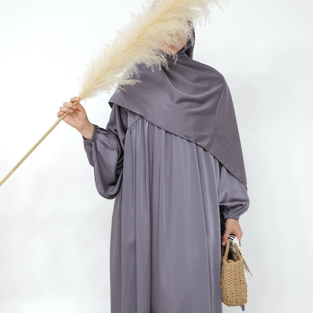 Get trendy with Amelia Satin Abaya Set - Silver - Dresses available at Voilee NY. Grab yours for $64.99 today!