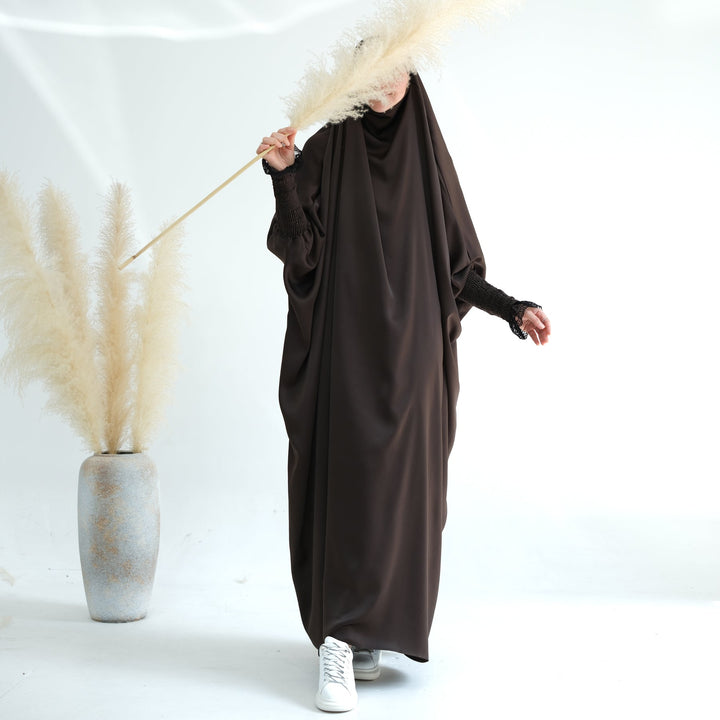 Get trendy with Marwa Satin Jilbab - Coffee - Dresses available at Voilee NY. Grab yours for $44.99 today!