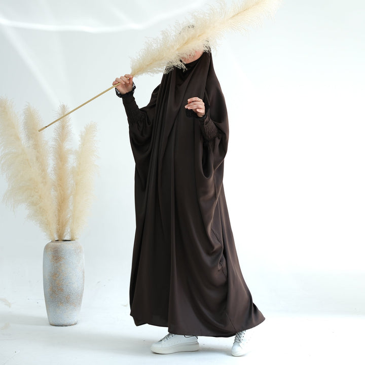 Get trendy with Marwa Satin Jilbab - Coffee - Dresses available at Voilee NY. Grab yours for $44.99 today!