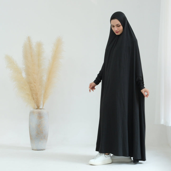 Get trendy with Awra Cape Hijab Combo - Black - Dresses available at Voilee NY. Grab yours for $54.90 today!