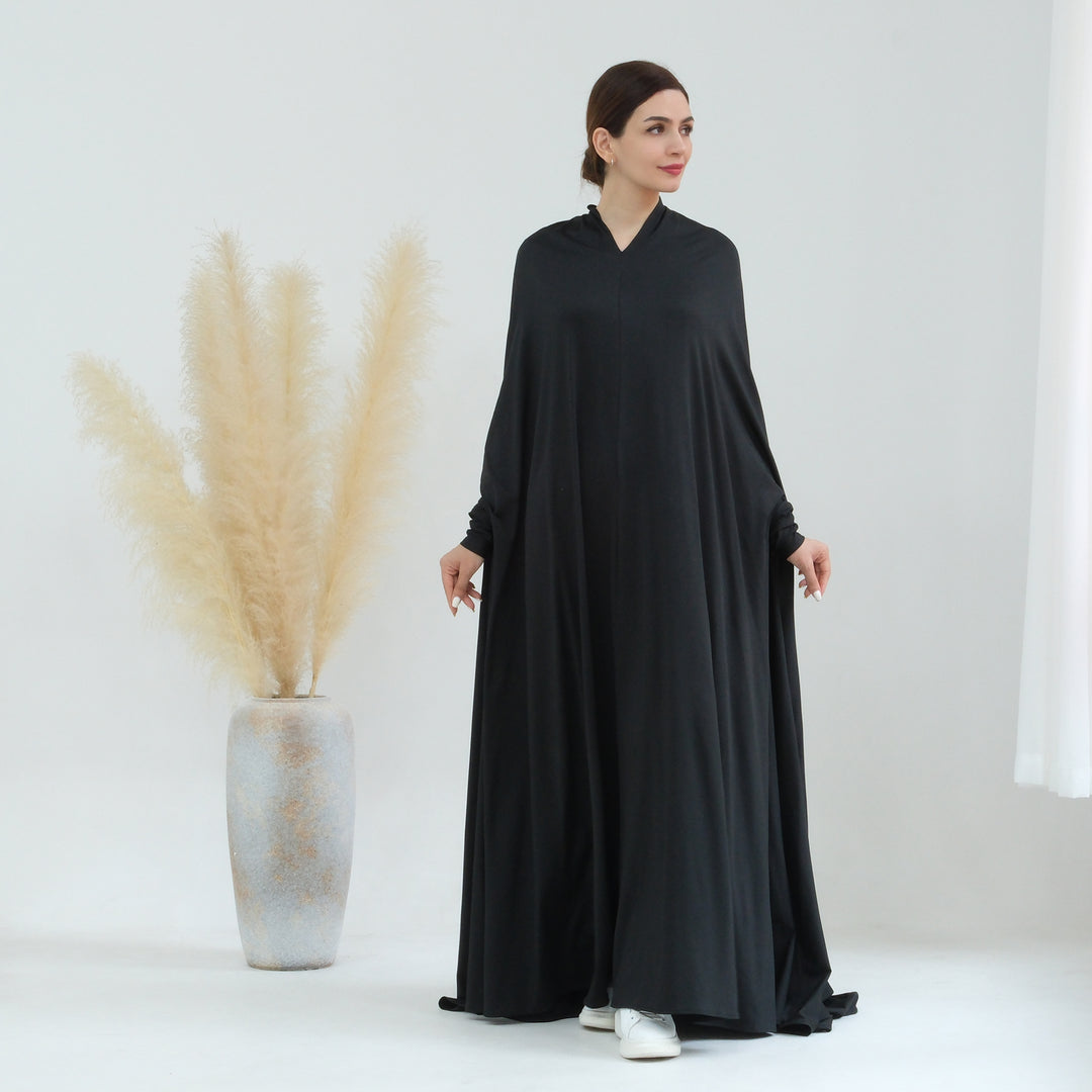 Get trendy with Awra Cape Hijab Combo - Black - Dresses available at Voilee NY. Grab yours for $54.90 today!