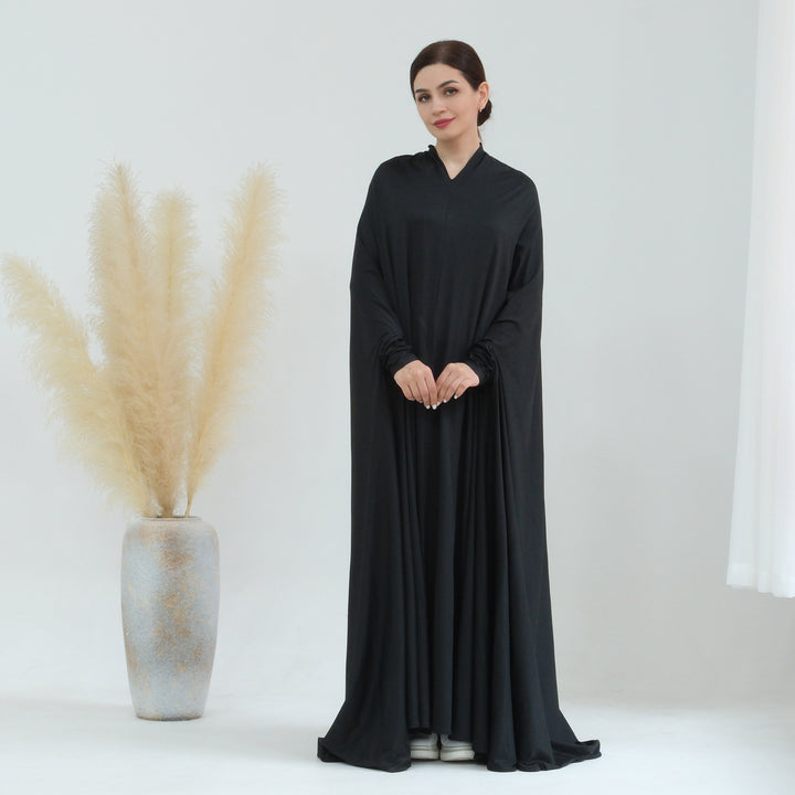 Get trendy with Awra Cape Hijab Combo - Black - Dresses available at Voilee NY. Grab yours for $54.90 today!