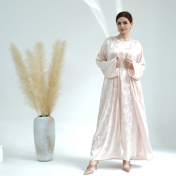 Get trendy with Brielle Satin Open Abaya - Blushing Peach - Dresses available at Voilee NY. Grab yours for $64.90 today!