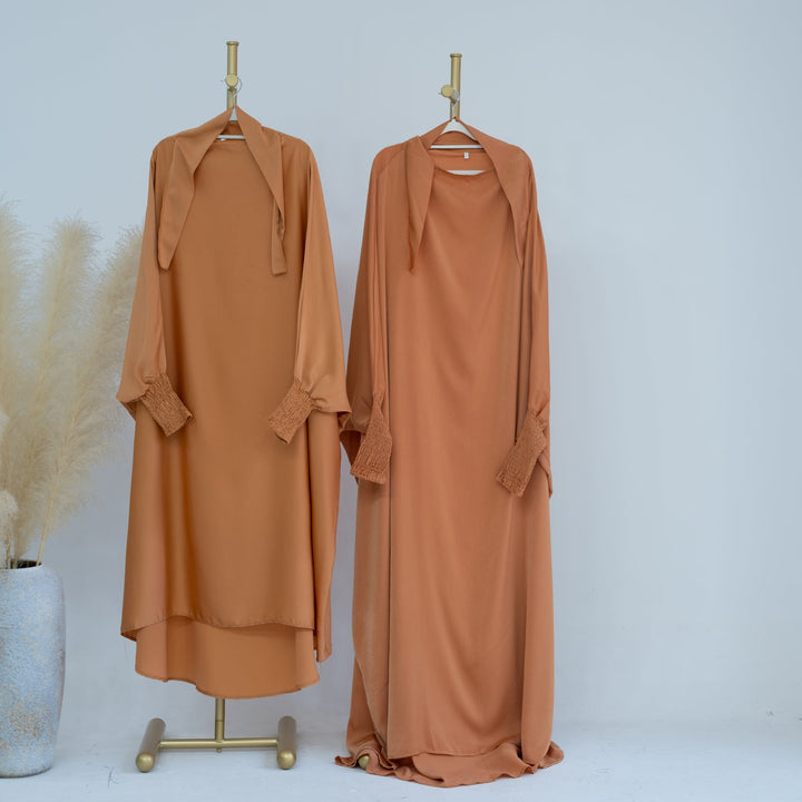 Get trendy with Marwa Kids Satin Jilbab - Sandstone - Dresses available at Voilee NY. Grab yours for $39.90 today!
