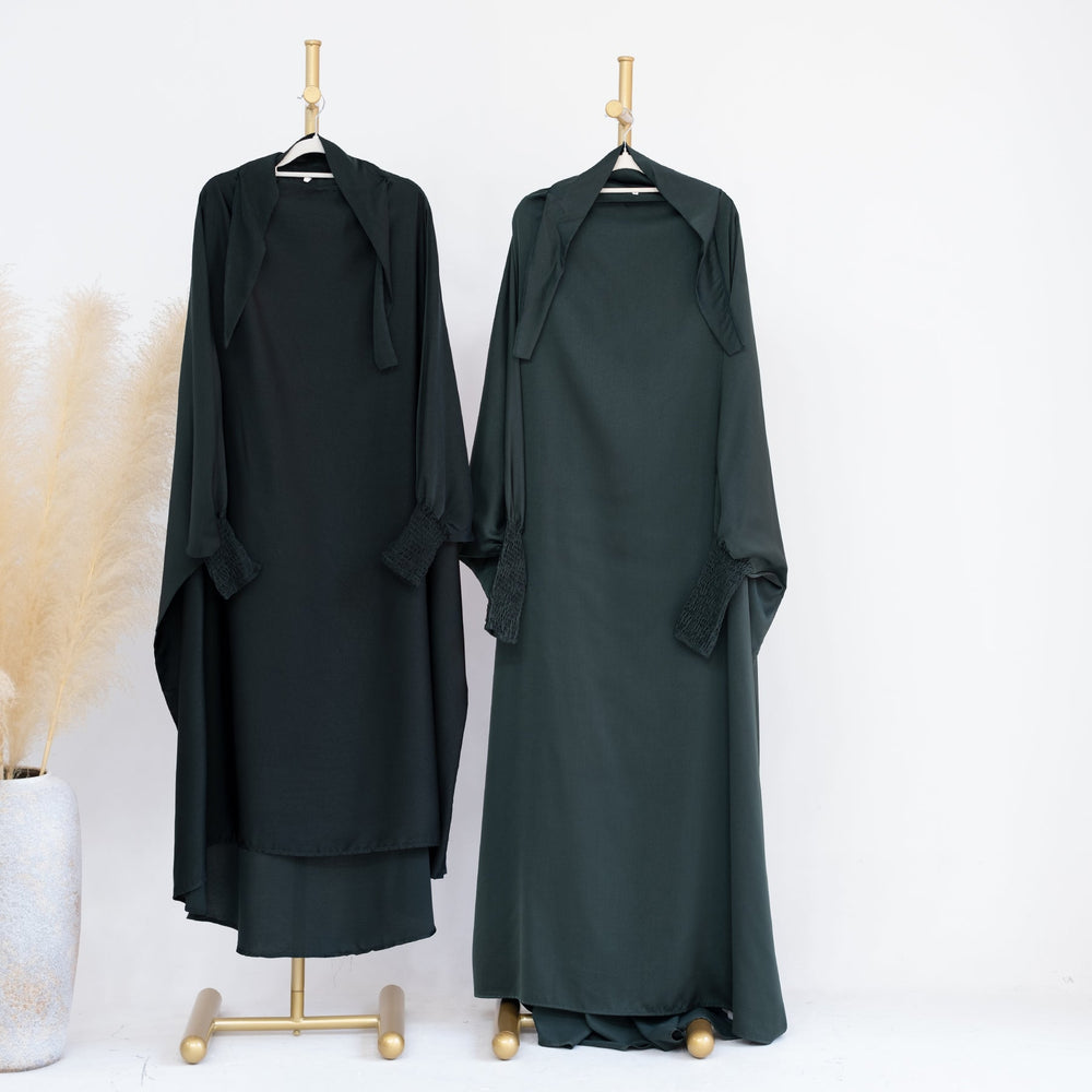Get trendy with Marwa Kids Satin Jilbab - Dark Green - Dresses available at Voilee NY. Grab yours for $39.90 today!