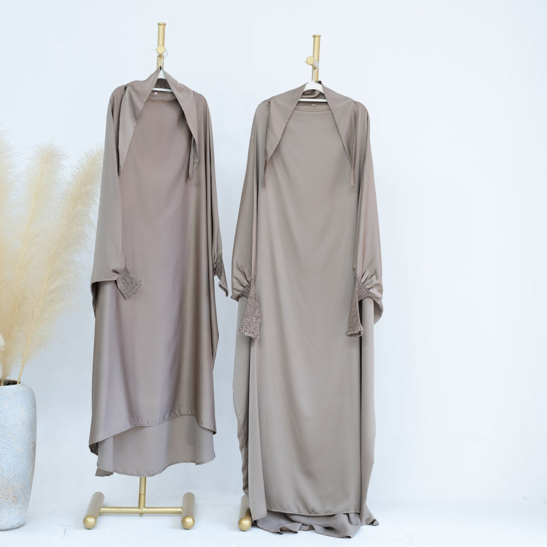Get trendy with Marwa Kids Satin Jilbab - Ash - Dresses available at Voilee NY. Grab yours for $39.90 today!