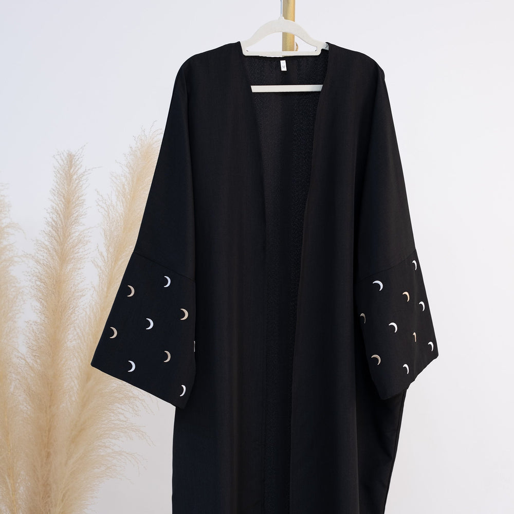 Get trendy with Iris Lightweight Duster Open Abaya - Black - Cardigan available at Voilee NY. Grab yours for $54.90 today!