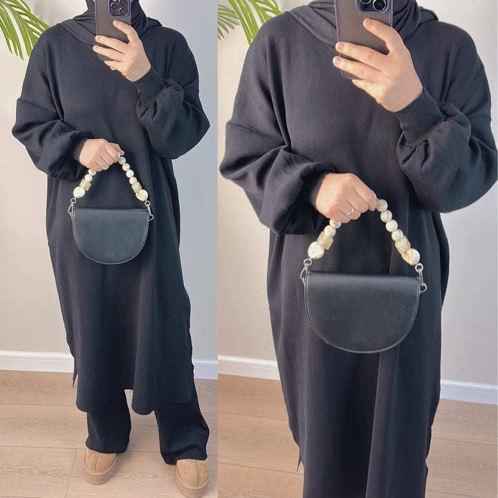 Get trendy with 2-piece Maxi Knit Sweatsuit - Black - Pants set available at Voilee NY. Grab yours for $79.90 today!