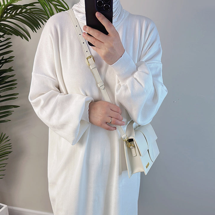 Get trendy with 2-piece Maxi Knit Sweatsuit - Ivory - Pants set available at Voilee NY. Grab yours for $79.90 today!