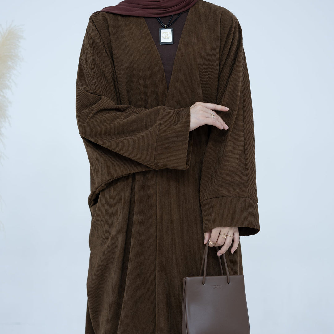 Get trendy with Melissa Corduroy Autumn Duster - Chocolate - Cardigan available at Voilee NY. Grab yours for $54.90 today!