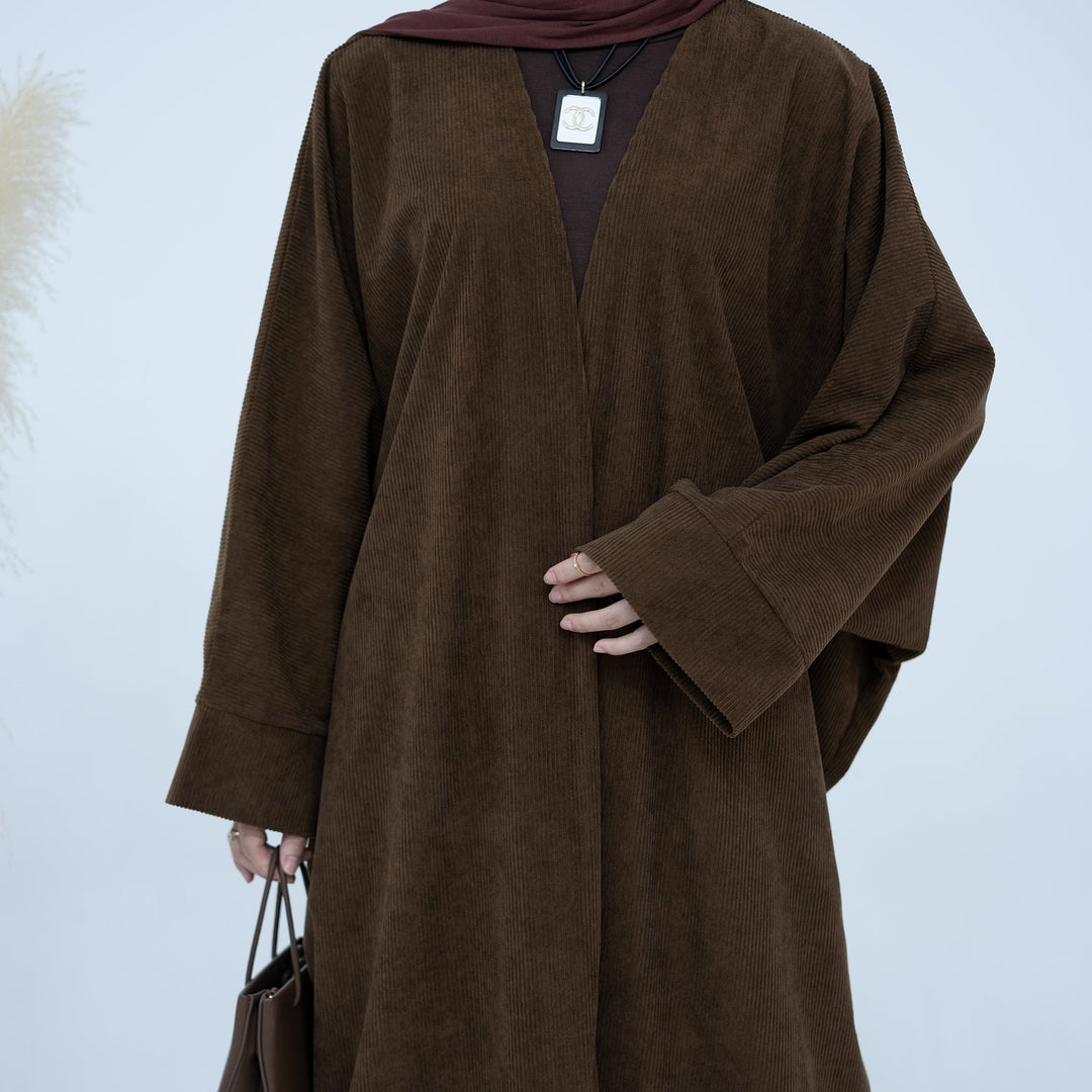 Get trendy with Melissa Corduroy Autumn Duster - Chocolate - Cardigan available at Voilee NY. Grab yours for $54.90 today!