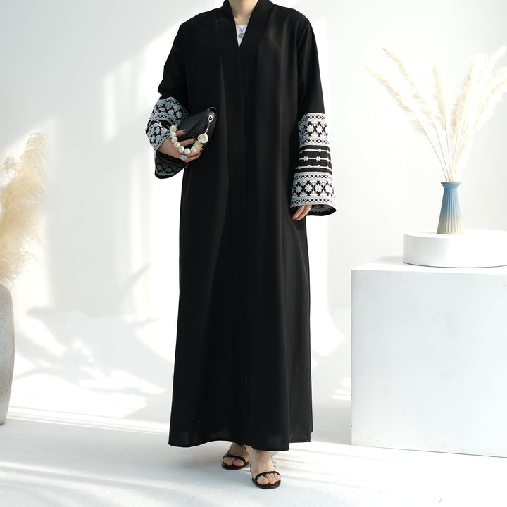 Get trendy with Balkis Embroidered Open Abaya - Black -  available at Voilee NY. Grab yours for $64.90 today!