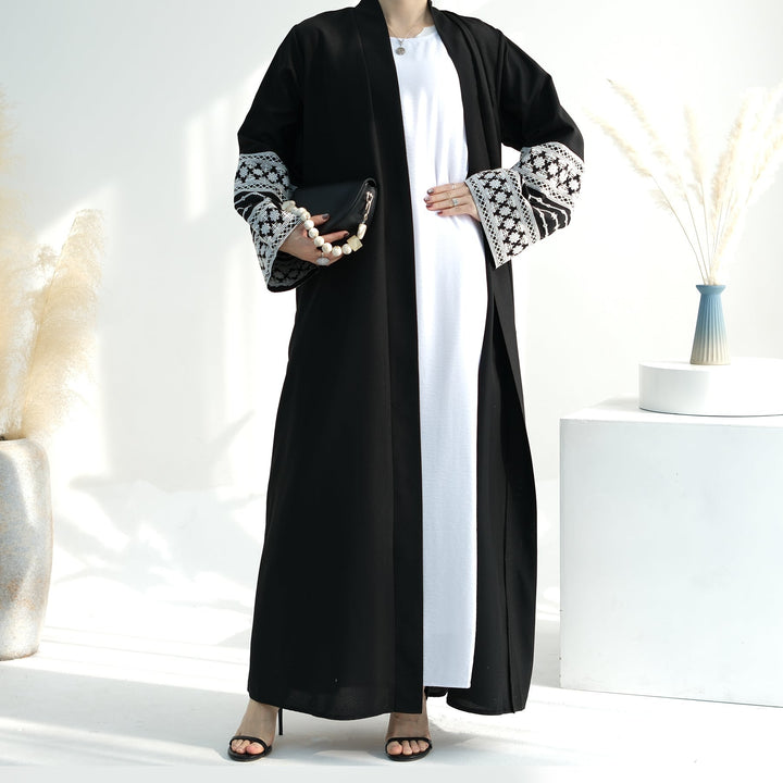 Get trendy with Balkis Embroidered Open Abaya - Black -  available at Voilee NY. Grab yours for $29.99 today!