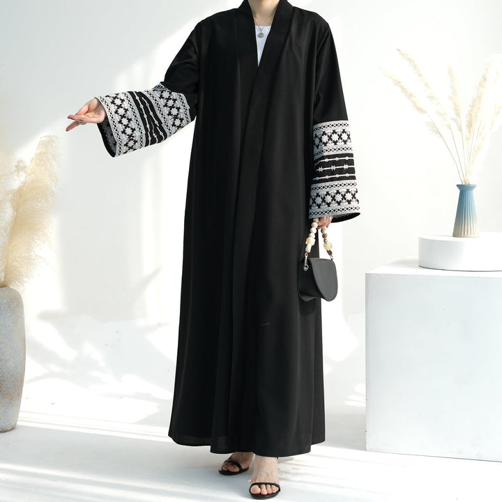 Get trendy with Balkis Embroidered Open Abaya - Black -  available at Voilee NY. Grab yours for $64.90 today!