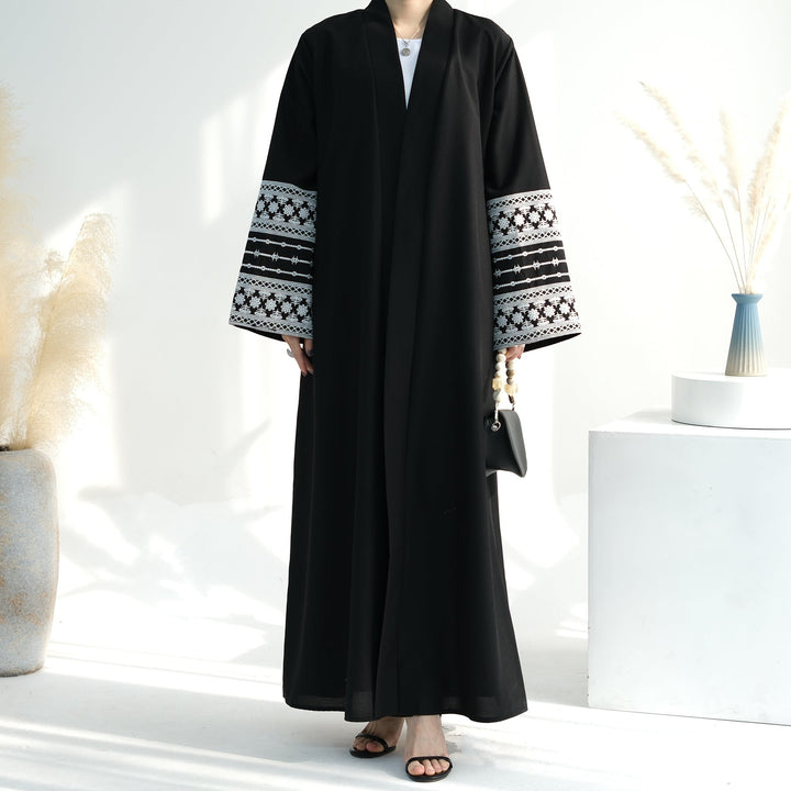 Get trendy with Balkis Embroidered Open Abaya - Black -  available at Voilee NY. Grab yours for $29.99 today!