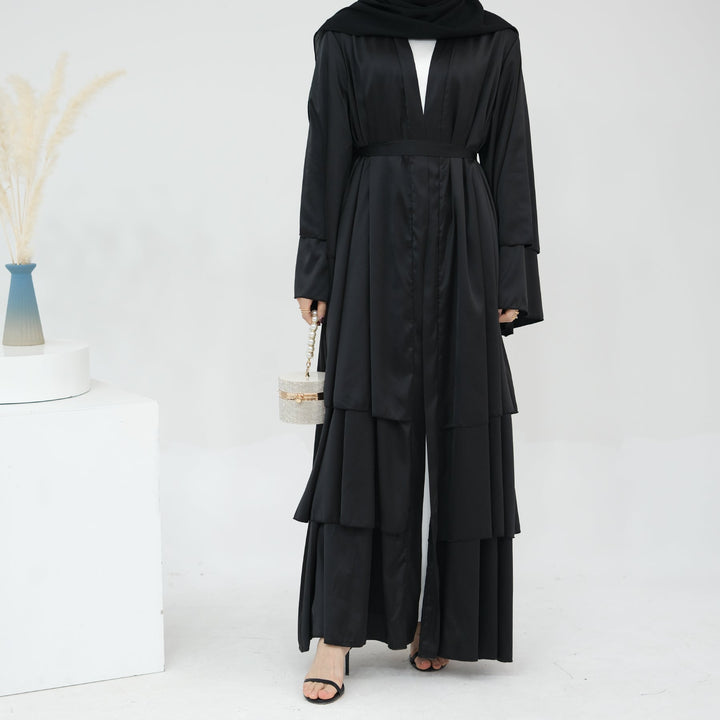 Get trendy with Miranda Layered Hem Satin Open Abaya - Black -  available at Voilee NY. Grab yours for $69.90 today!