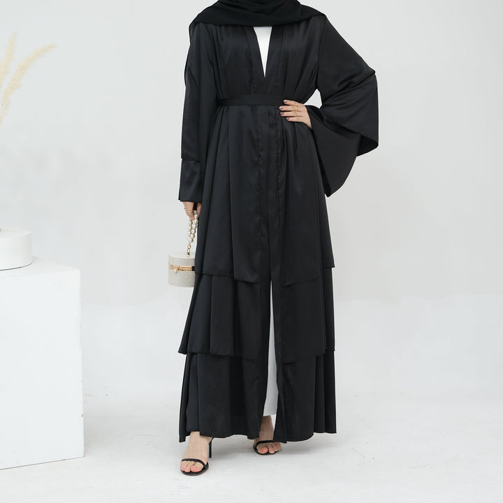 Get trendy with Miranda Layered Hem Satin Open Abaya - Black -  available at Voilee NY. Grab yours for $69.90 today!