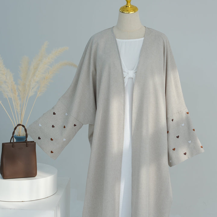 Get trendy with Amna Cotton Linen Mix Duster - Dove Brown Heart -  available at Voilee NY. Grab yours for $64.90 today!
