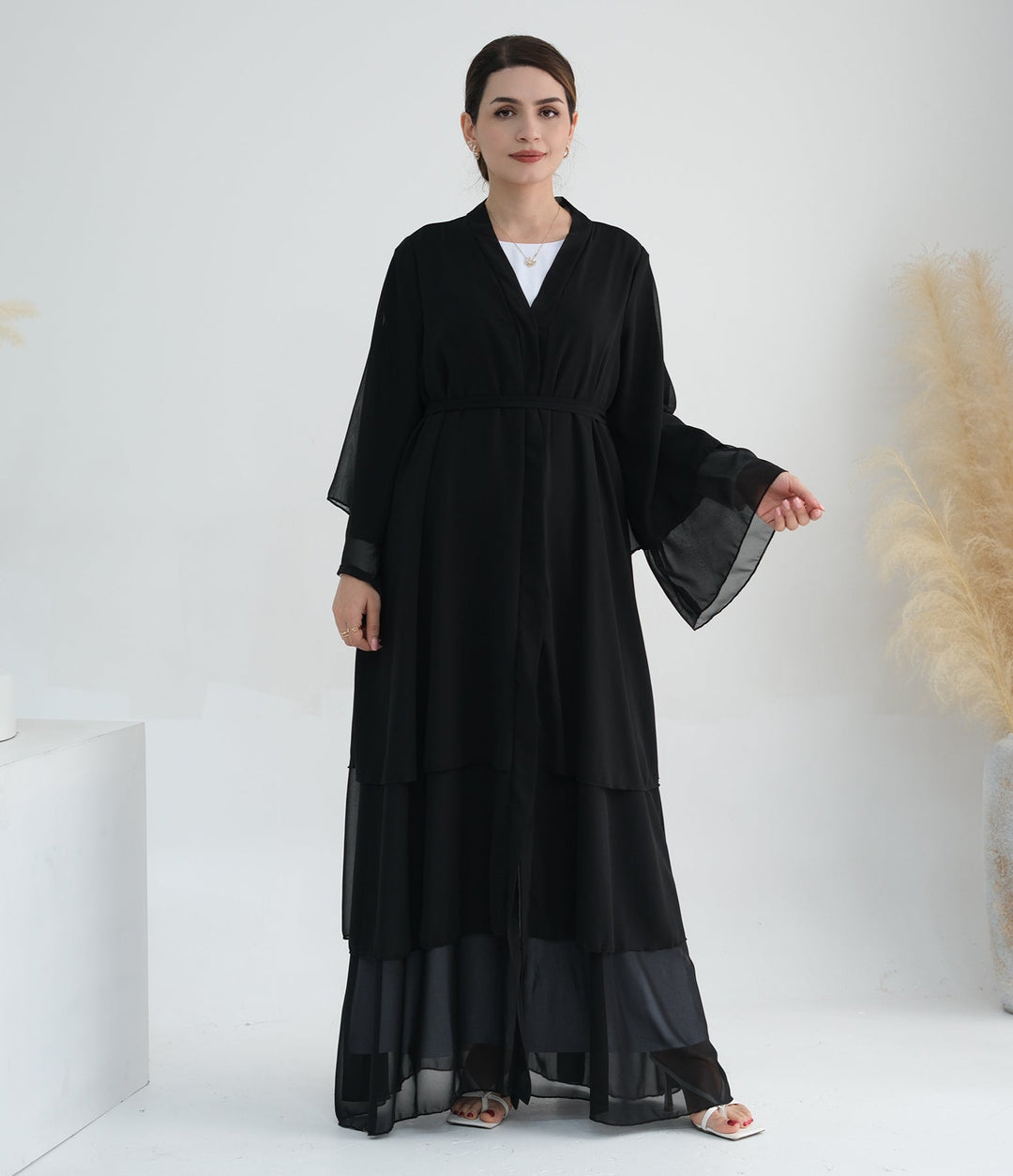 Get trendy with Zariah Layered Hem Chiffon Open Abaya - Black - Cardigan available at Voilee NY. Grab yours for $69.90 today!