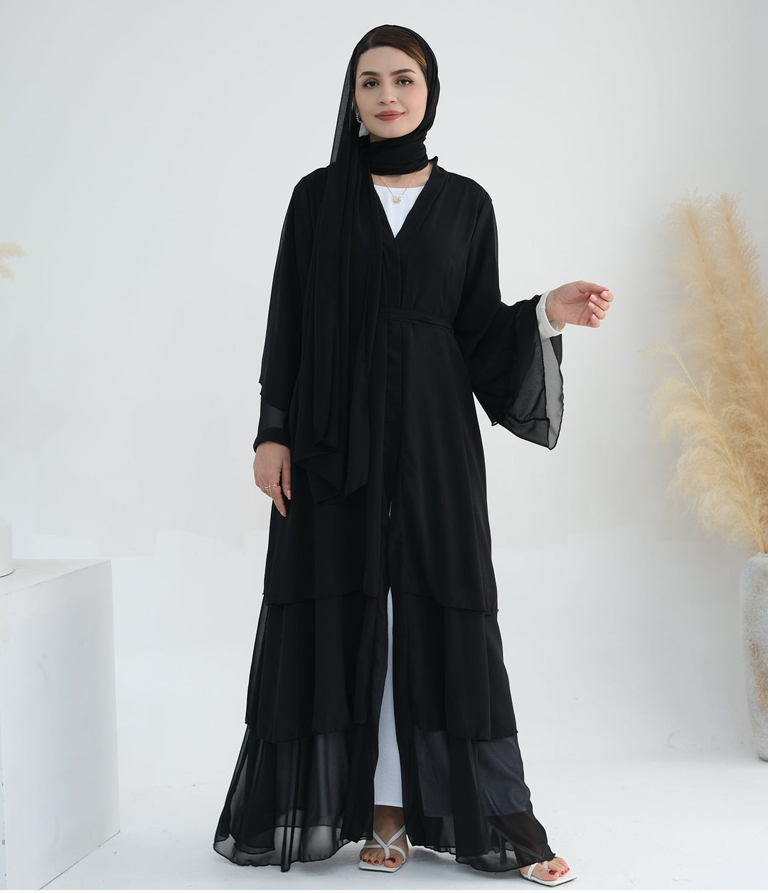 Get trendy with Zariah Layered Hem Chiffon Open Abaya - Black - Cardigan available at Voilee NY. Grab yours for $69.90 today!