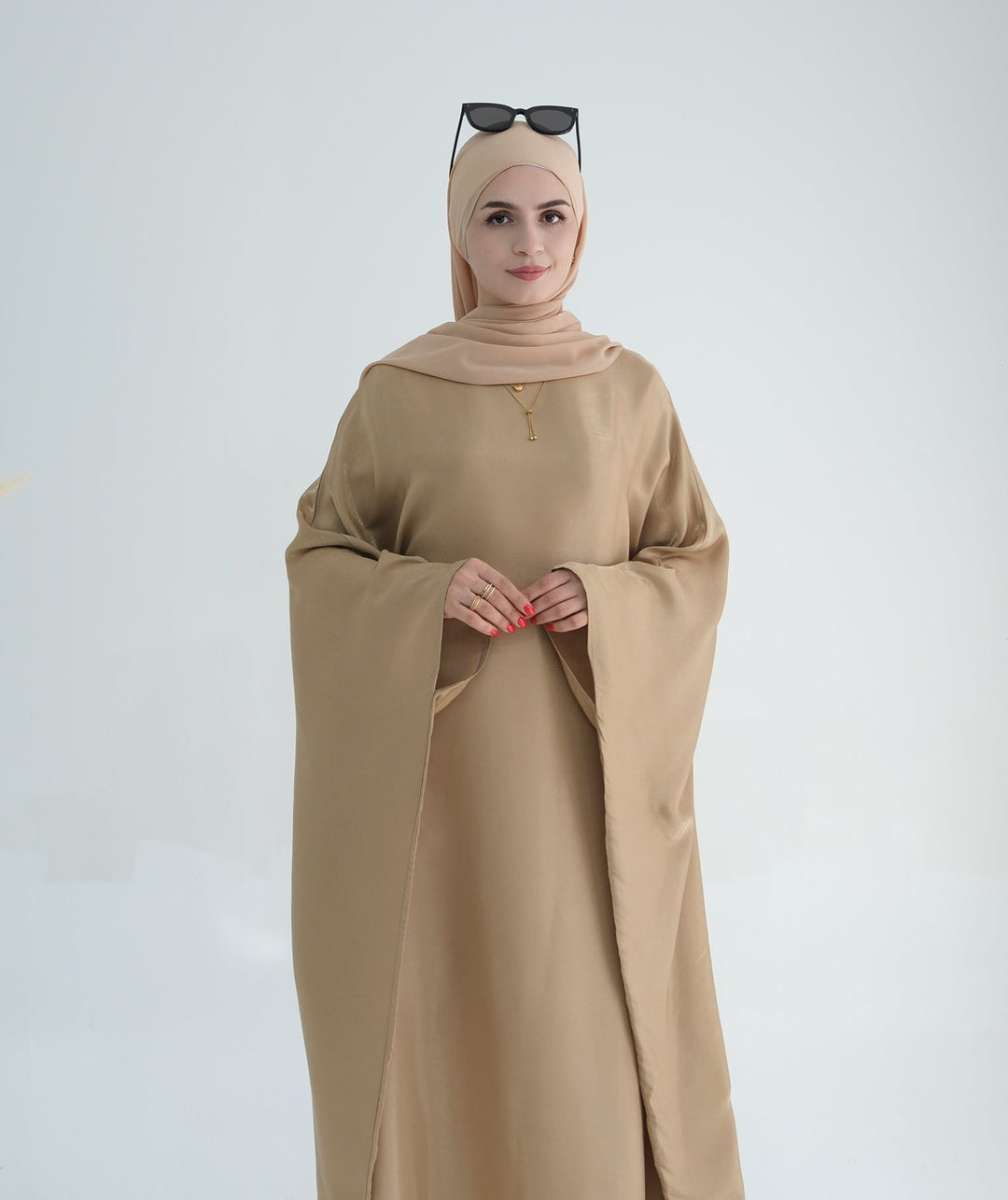 Get trendy with Yuna Shimmer Butterfly Abaya - Tan Brown -  available at Voilee NY. Grab yours for $59.90 today!