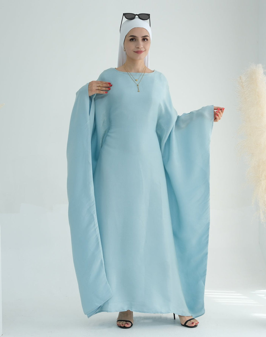 Get trendy with Yuna Shimmer Butterfly Abaya - Blue -  available at Voilee NY. Grab yours for $59.90 today!