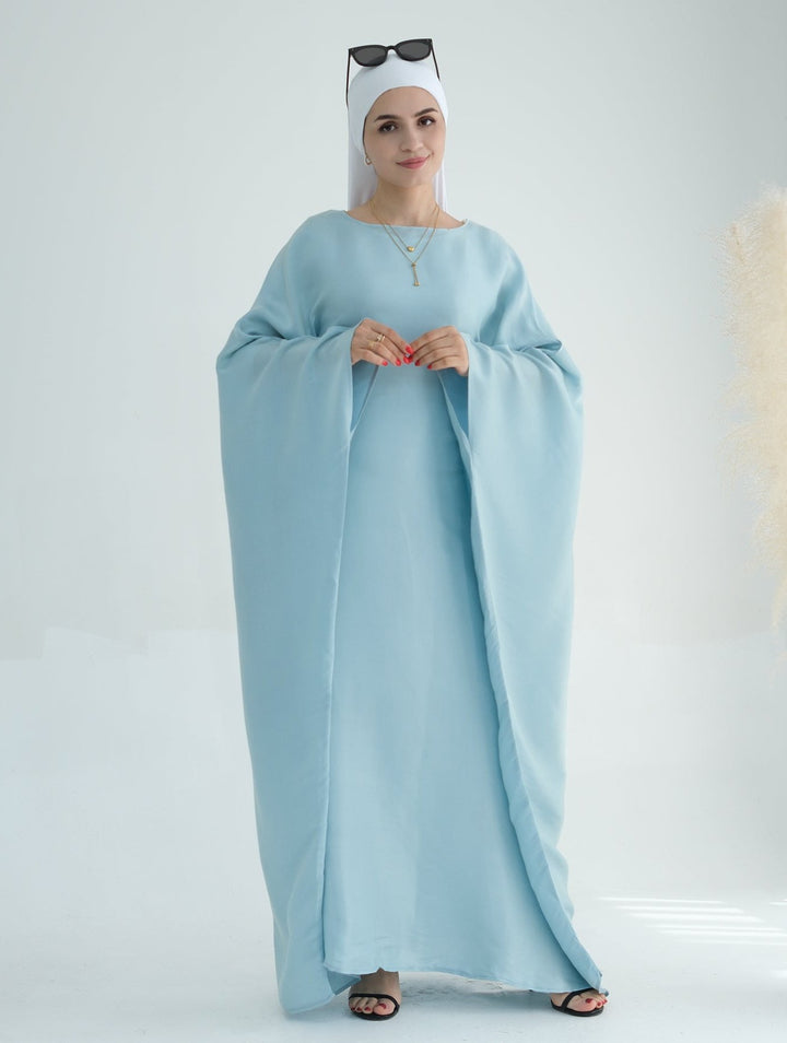 Get trendy with Yuna Shimmer Butterfly Abaya - Blue -  available at Voilee NY. Grab yours for $59.90 today!