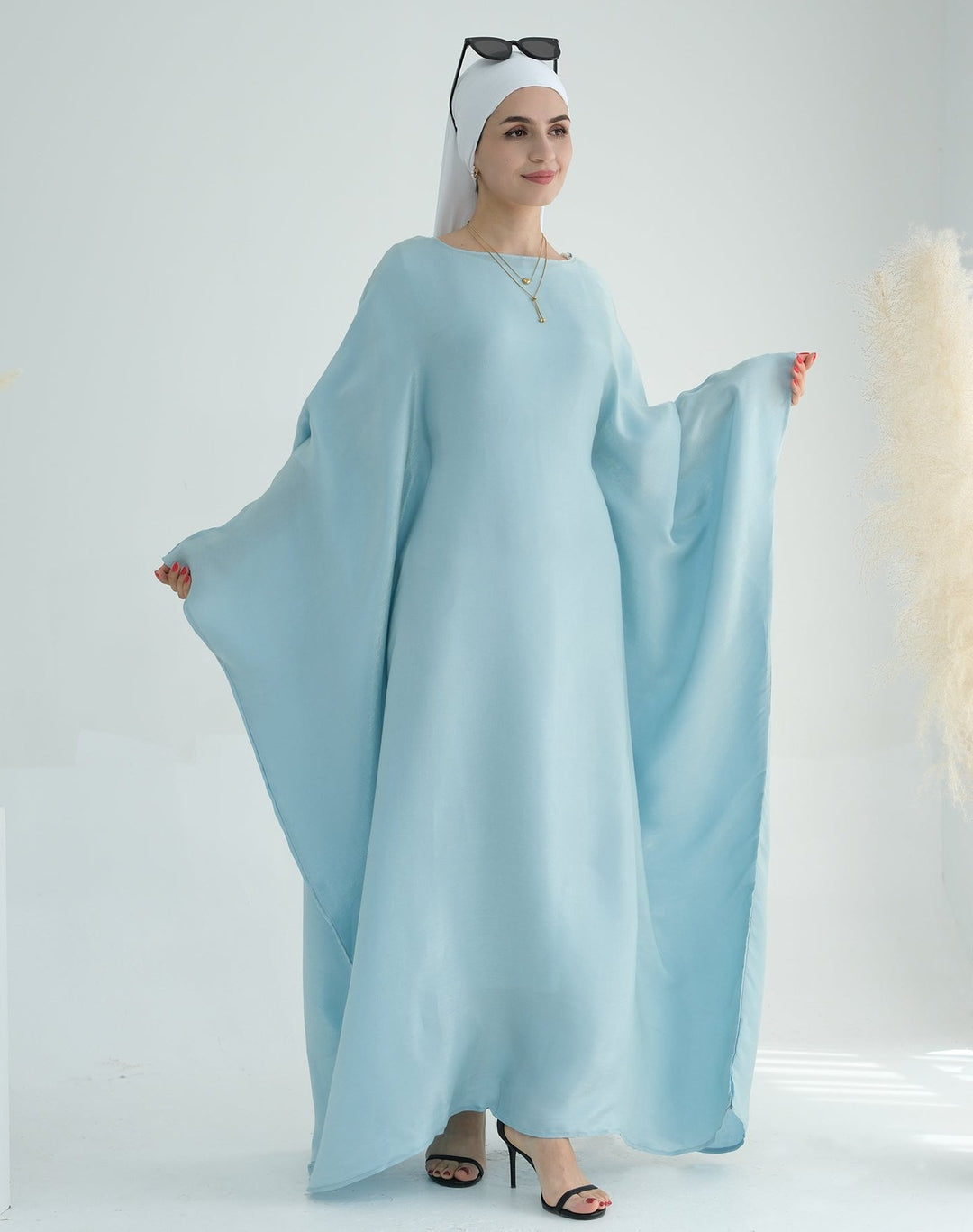 Get trendy with Yuna Shimmer Butterfly Abaya - Blue -  available at Voilee NY. Grab yours for $59.90 today!