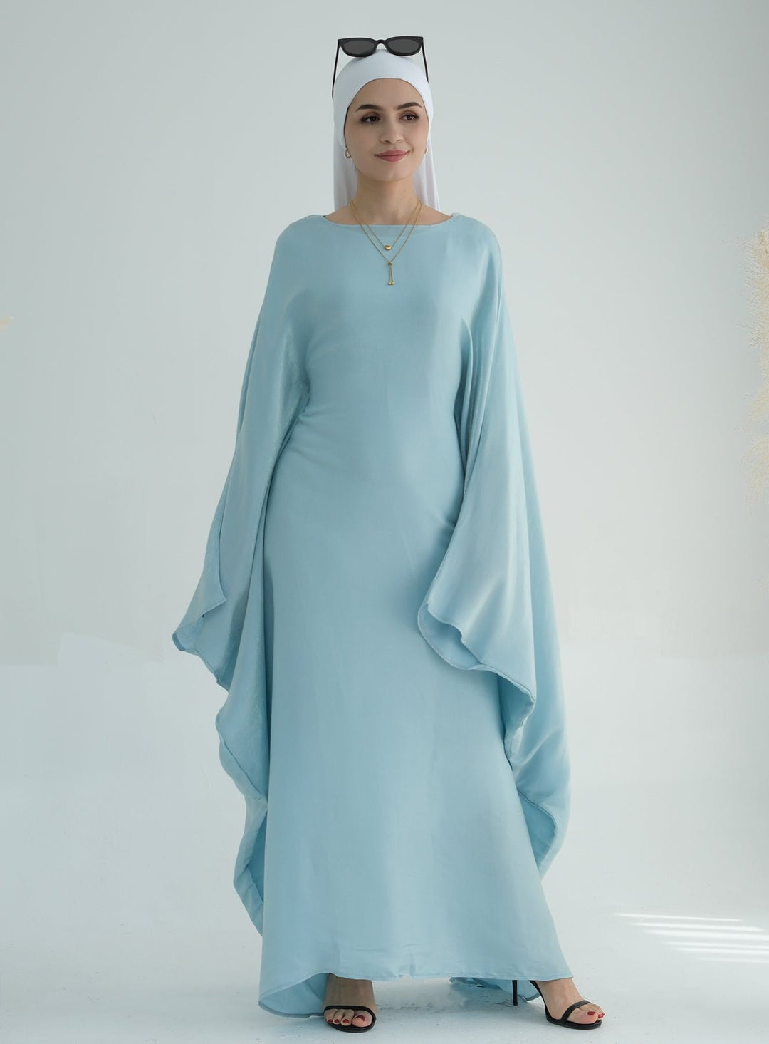 Get trendy with Yuna Shimmer Butterfly Abaya - Blue -  available at Voilee NY. Grab yours for $59.90 today!