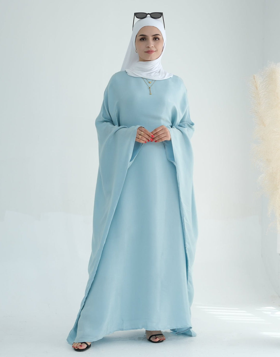 Get trendy with Yuna Shimmer Butterfly Abaya - Blue -  available at Voilee NY. Grab yours for $59.90 today!