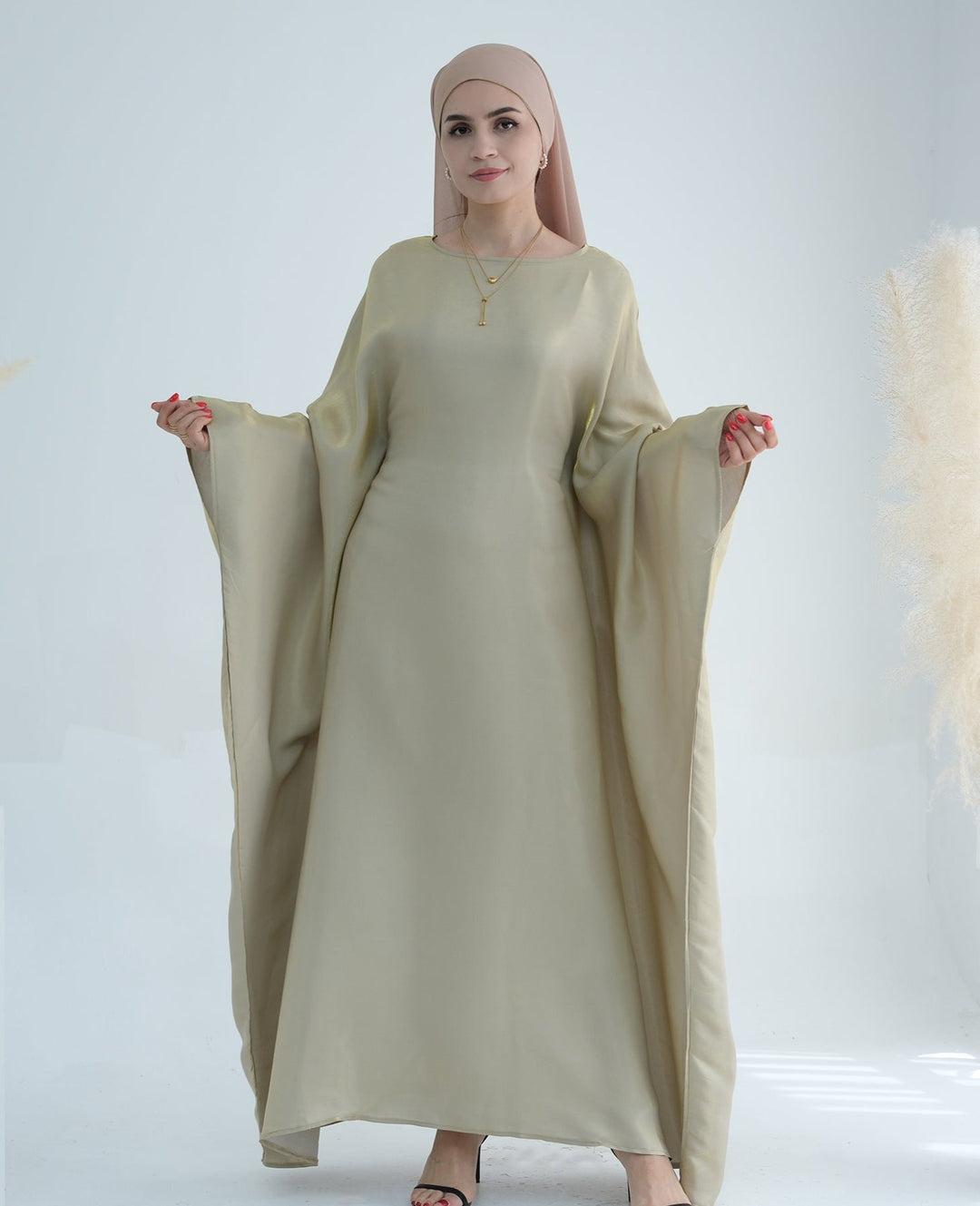 Get trendy with Yuna Shimmer Butterfly Abaya - Beige -  available at Voilee NY. Grab yours for $59.90 today!