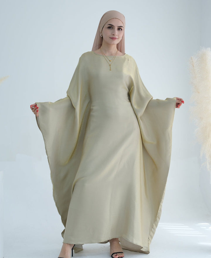 Get trendy with Yuna Shimmer Butterfly Abaya - Beige -  available at Voilee NY. Grab yours for $59.90 today!