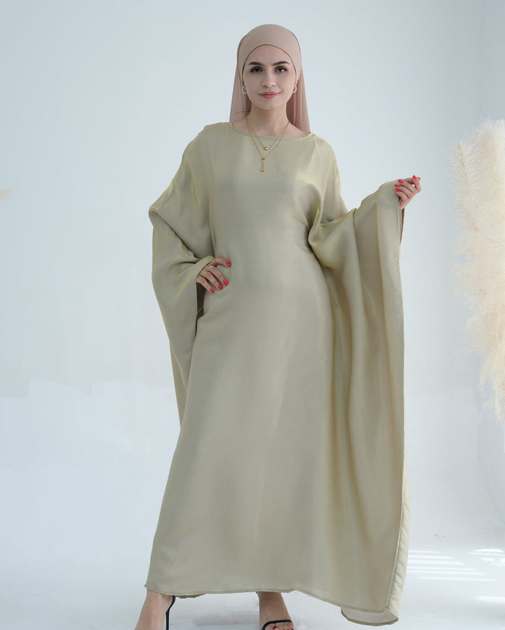 Get trendy with Yuna Shimmer Butterfly Abaya - Beige -  available at Voilee NY. Grab yours for $59.90 today!