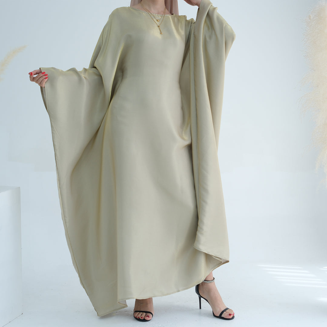 Get trendy with Yuna Shimmer Butterfly Abaya - Beige -  available at Voilee NY. Grab yours for $59.90 today!