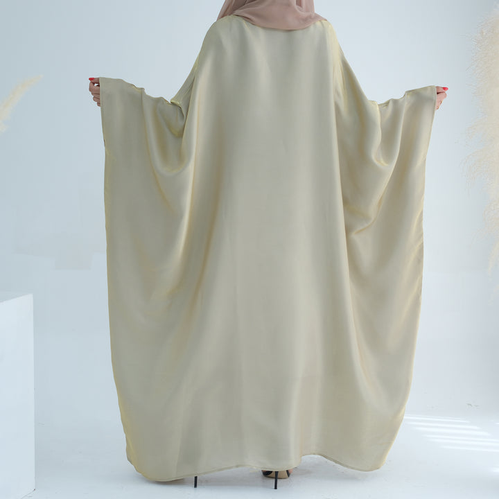 Get trendy with Yuna Shimmer Butterfly Abaya - Beige -  available at Voilee NY. Grab yours for $59.90 today!