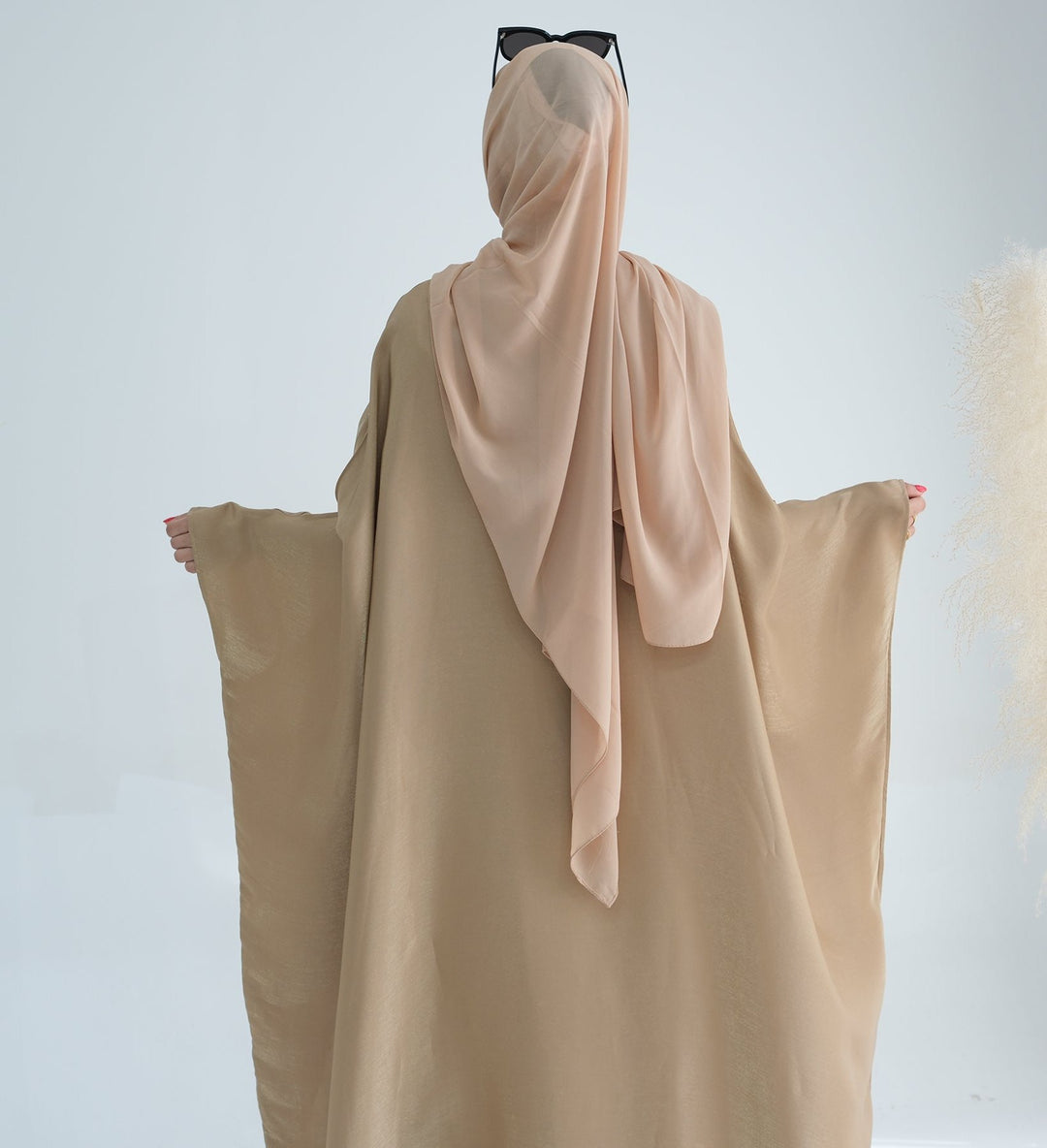 Get trendy with Yuna Shimmer Butterfly Abaya - Tan Brown -  available at Voilee NY. Grab yours for $59.90 today!