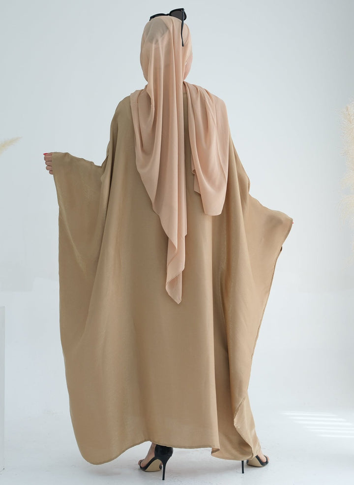 Get trendy with Yuna Shimmer Butterfly Abaya - Tan Brown -  available at Voilee NY. Grab yours for $59.90 today!