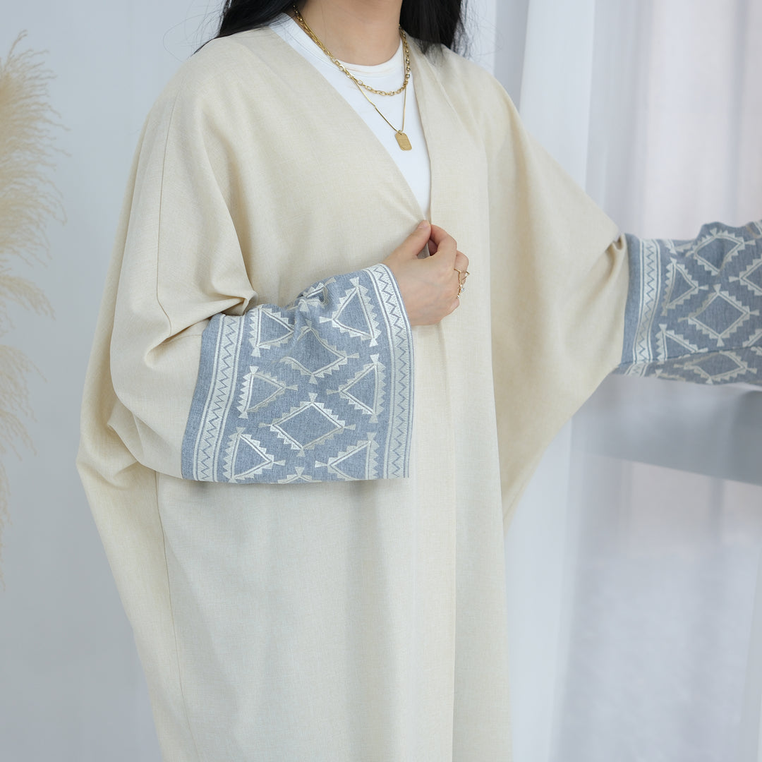 Get trendy with Rania Open Abaya Kimono - Sand - Cardigan available at Voilee NY. Grab yours for $49.90 today!