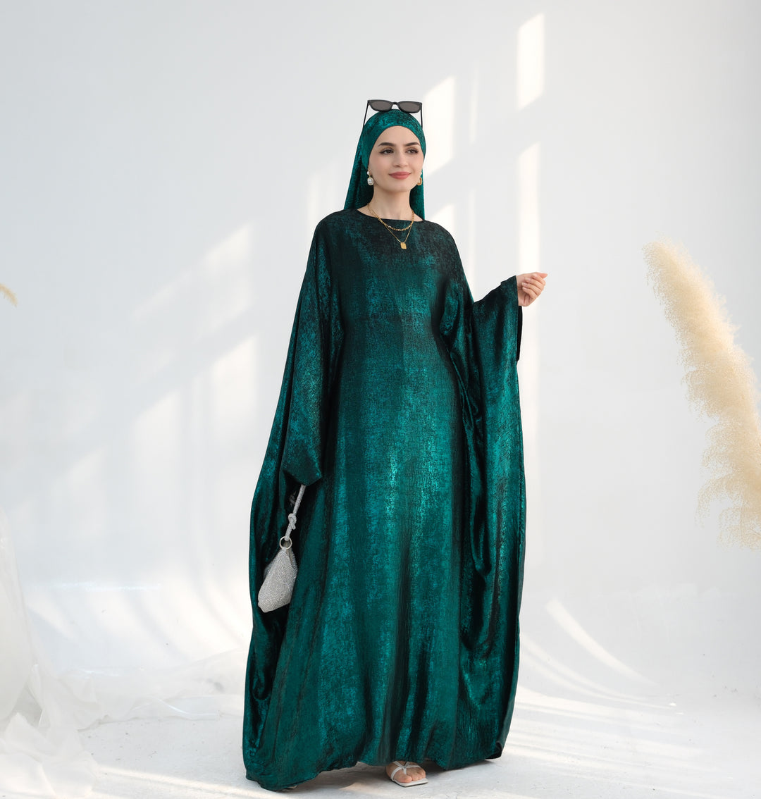 Get trendy with Linora Shimmer Butterfly Abaya - Green - Dresses available at Voilee NY. Grab yours for $59.90 today!