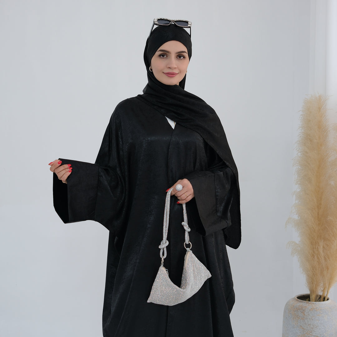 Get trendy with Draya Shimmer Kimono Open Abaya - Black - Cardigan available at Voilee NY. Grab yours for $54.90 today!