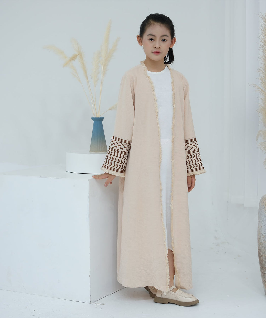 Get trendy with Kids Kufiya Open Abaya - Sand -  available at Voilee NY. Grab yours for $39.90 today!