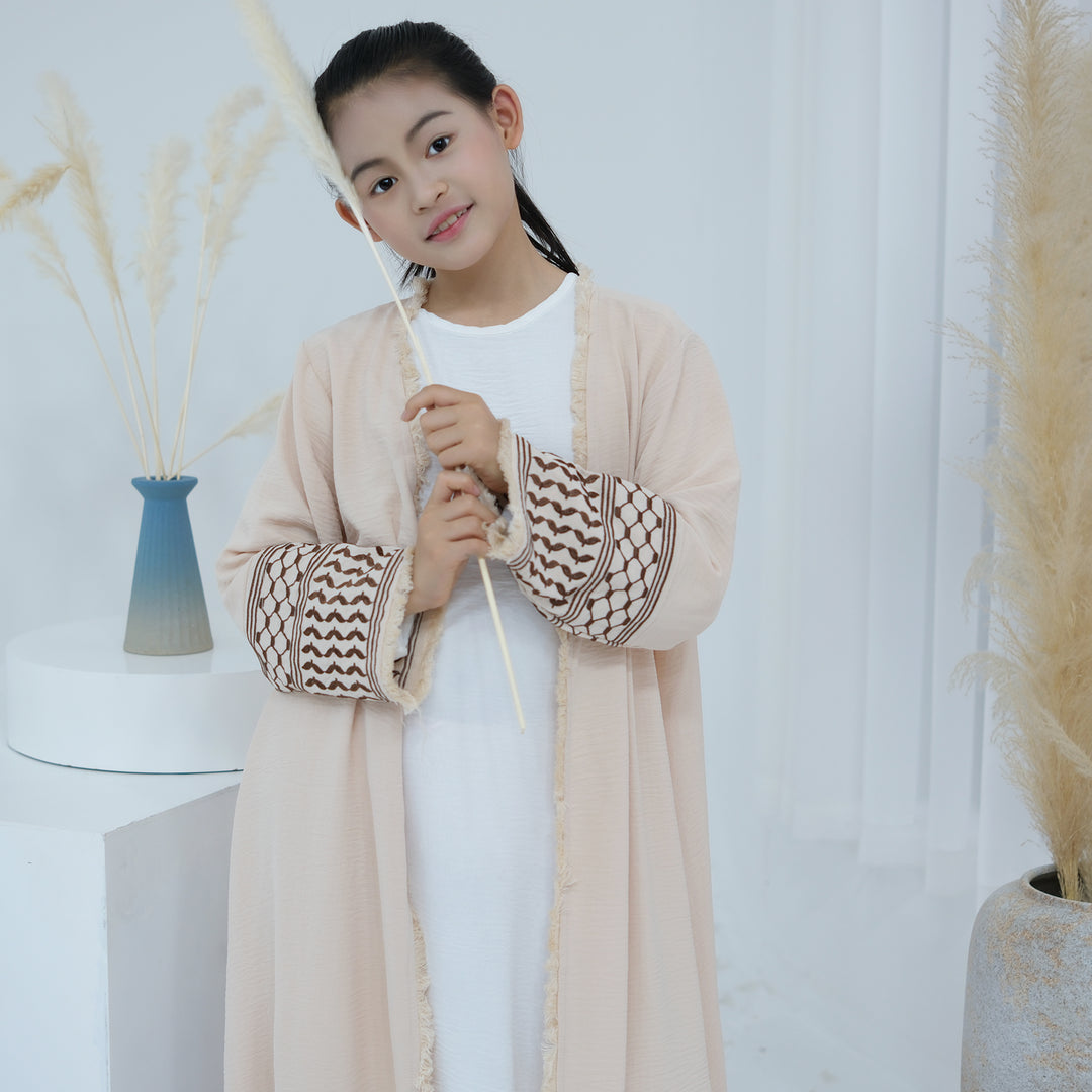 Get trendy with Kids Kufiya Open Abaya - Sand -  available at Voilee NY. Grab yours for $39.90 today!