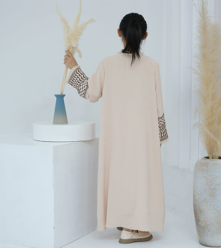 Get trendy with Kids Kufiya Open Abaya - Sand -  available at Voilee NY. Grab yours for $39.90 today!