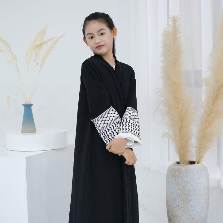 Get trendy with Kids Kufiya Open Abaya - Black -  available at Voilee NY. Grab yours for $39.90 today!