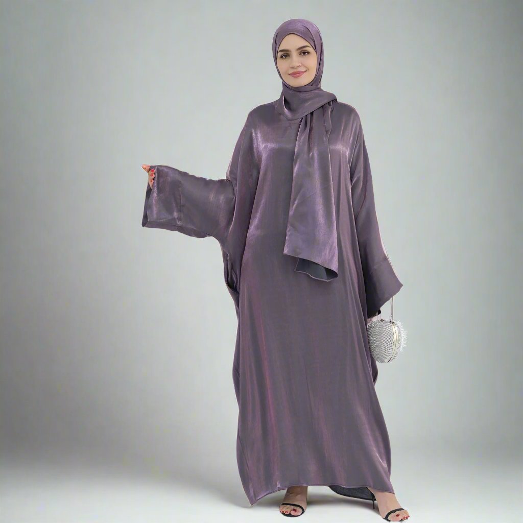 Get trendy with Nessa Shimmer Abaya with Hijab - Eggplant - Dresses available at Voilee NY. Grab yours for $54.90 today!