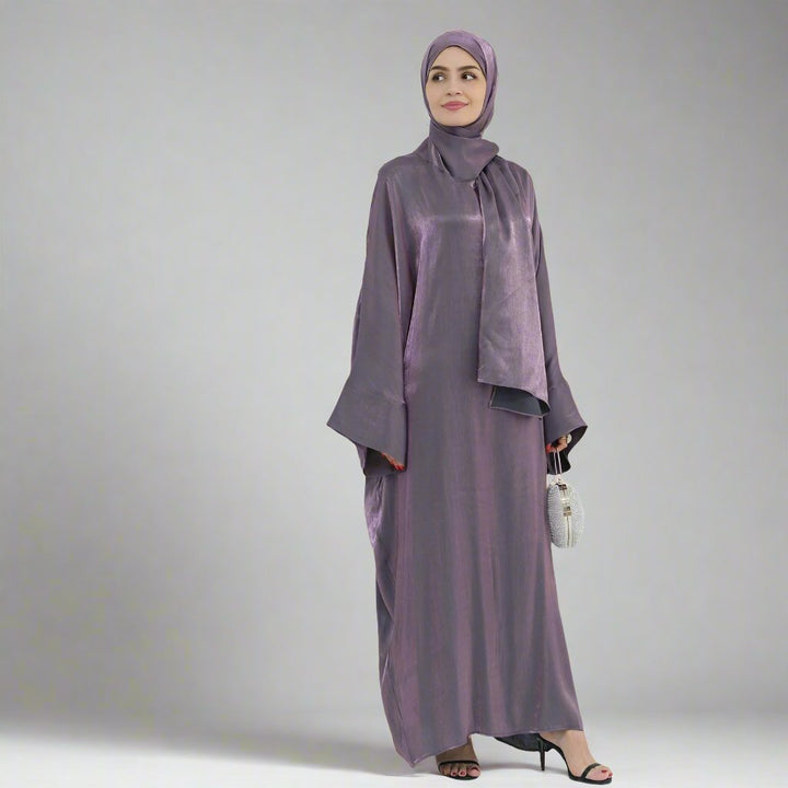 Get trendy with Nessa Shimmer Abaya with Hijab - Eggplant - Dresses available at Voilee NY. Grab yours for $54.90 today!