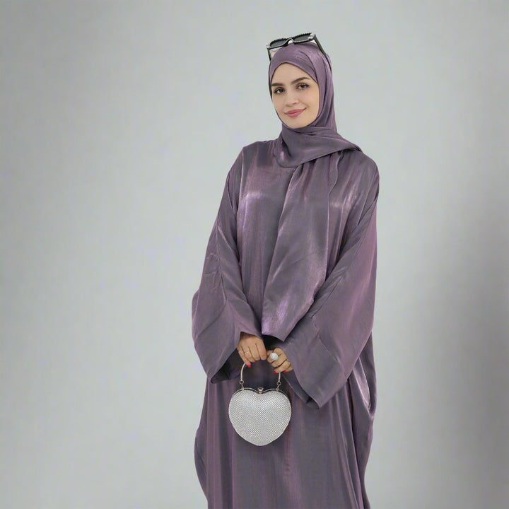 Get trendy with Nessa Shimmer Abaya with Hijab - Eggplant - Dresses available at Voilee NY. Grab yours for $54.90 today!