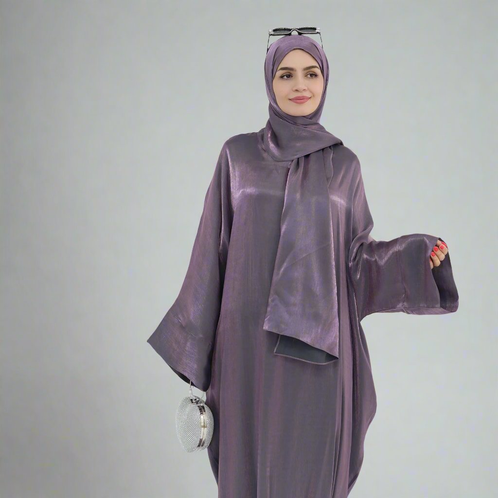 Get trendy with Nessa Shimmer Abaya with Hijab - Eggplant - Dresses available at Voilee NY. Grab yours for $54.90 today!