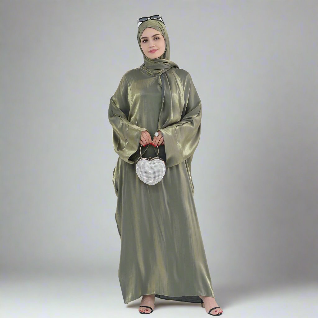 Get trendy with Nessa Shimmer Abaya with Hijab - Olive - Dresses available at Voilee NY. Grab yours for $54.90 today!